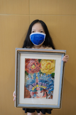 Yanli, a Thalassemia artist specialising in paper quilling.